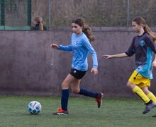 two students playing football